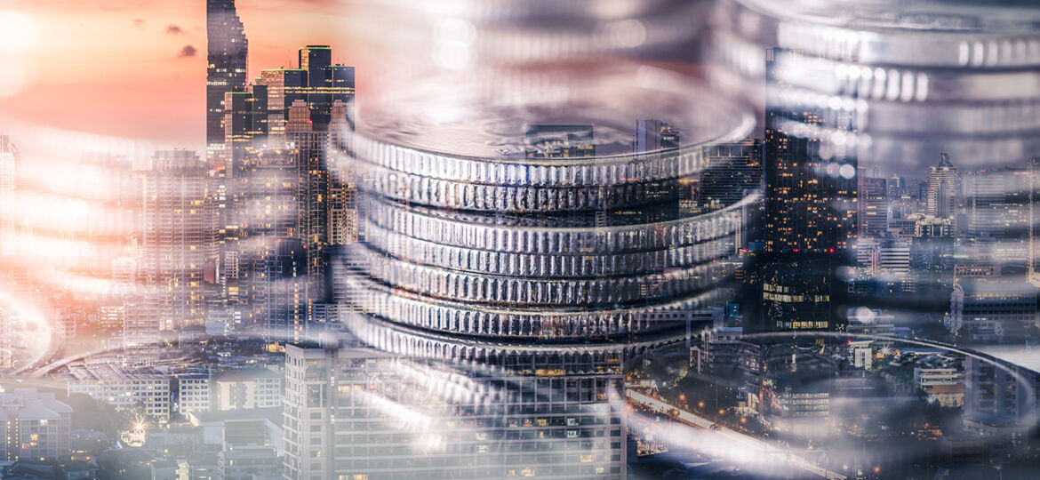 double exposure image of the coin stack overlay with cityscape i